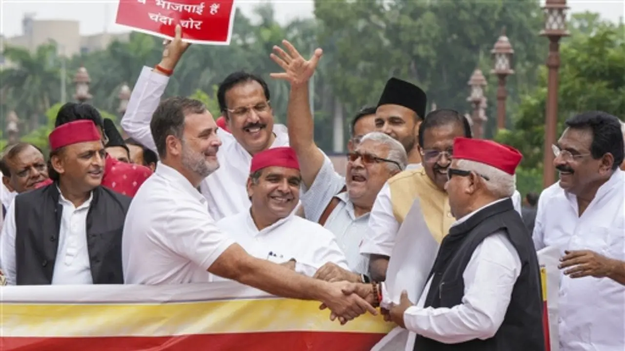 Lok Sabha introduces four Bills amid Opposition protests, adjourns till 2 pm Opposition MPs protest in the Lok Sabha during the Monsoon Session of Parliament in New Delhi. Pic/PTI